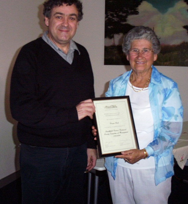 Mayor of Strathfield, Bill Carney and Doreen Rich in 2004, receiving certificate of service.